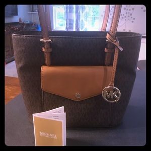 Michael Kors logo brown purse. New without tag.